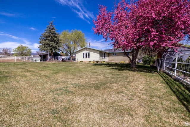 view of yard with fence