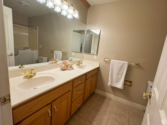 362 S Glen Cir, Fruit Heights, UT 84037 - bathroom with double vanity, a sink, toilet, and tile patterned floors