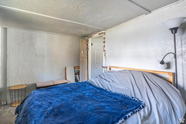 629 S 400 E, Salt Lake City, UT 84111 - bedroom with carpet floors, a textured wall, and a textured ceiling