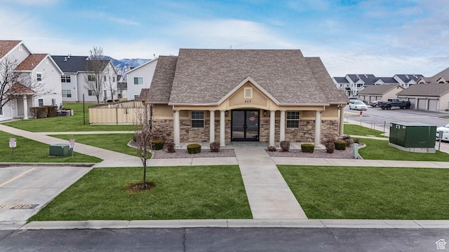 2522 W 500 S Unit 7, Springville, UT 84663 - view of front of property featuring stone siding, stucco siding, a front yard, and a residential view