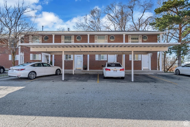 333 S Monroe Blvd Unit 23, Ogden, UT 84404 - view of property featuring covered parking