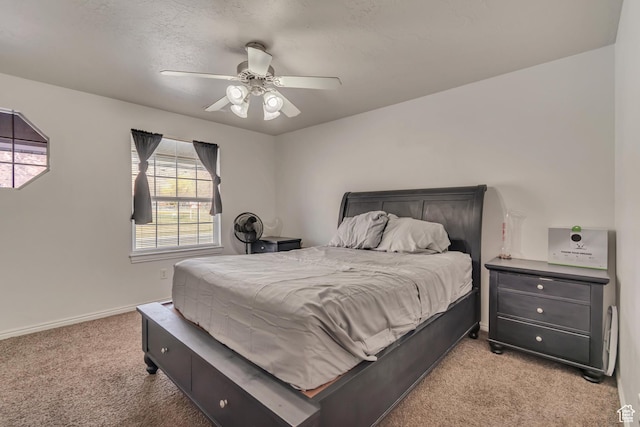 333 S Monroe Blvd Unit 23, Ogden, UT 84404 - bedroom with light carpet, baseboards, and ceiling fan