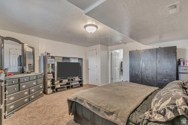 333 S Monroe Blvd Unit 23, Ogden, UT 84404 - carpeted bedroom featuring visible vents and a textured ceiling