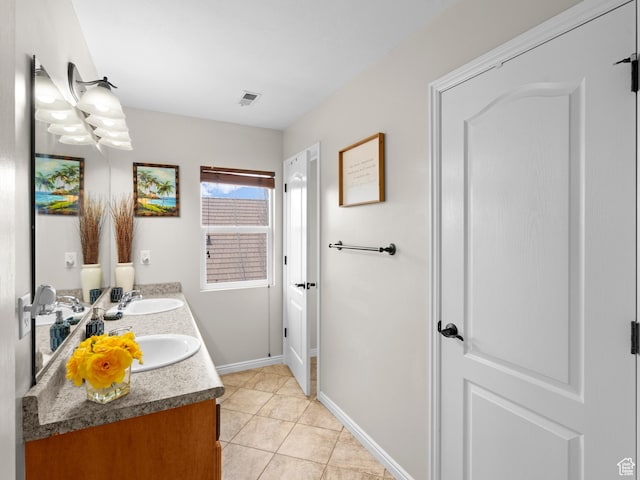 14526 Long Ridge Dr, Herriman, UT 84096 - full bath with visible vents, a sink, tile patterned flooring, and double vanity