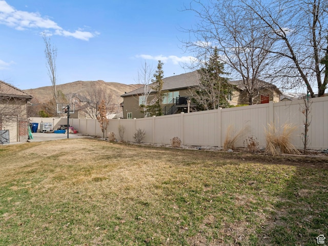 14526 Long Ridge Dr, Herriman, UT 84096 - view of yard with a fenced backyard, a patio, and a mountain view