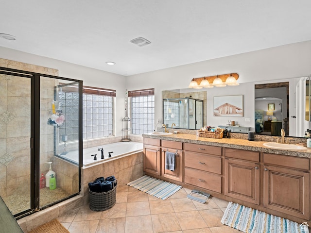 14526 Long Ridge Dr, Herriman, UT 84096 - full bathroom featuring a stall shower, tile patterned floors, a sink, a garden tub, and double vanity