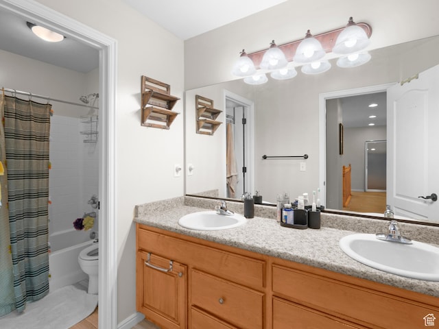 14526 Long Ridge Dr, Herriman, UT 84096 - full bathroom with double vanity, a sink, shower / bath combo with shower curtain, and toilet