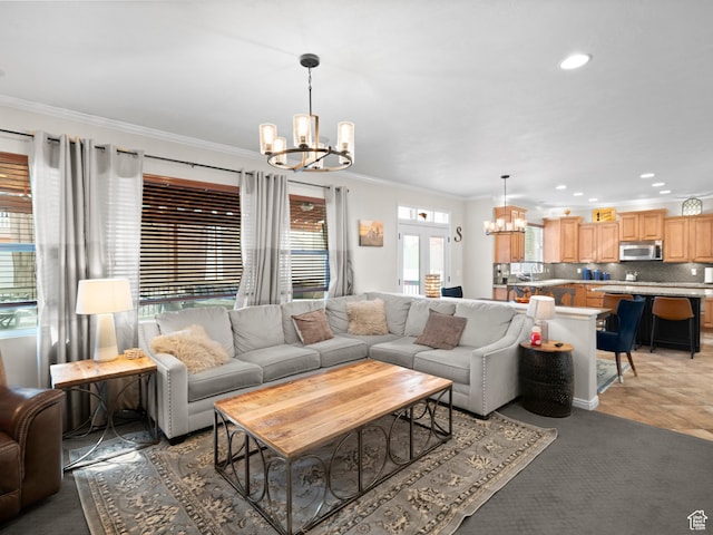 14526 Long Ridge Dr, Herriman, UT 84096 - living area with light carpet, a notable chandelier, recessed lighting, and ornamental molding