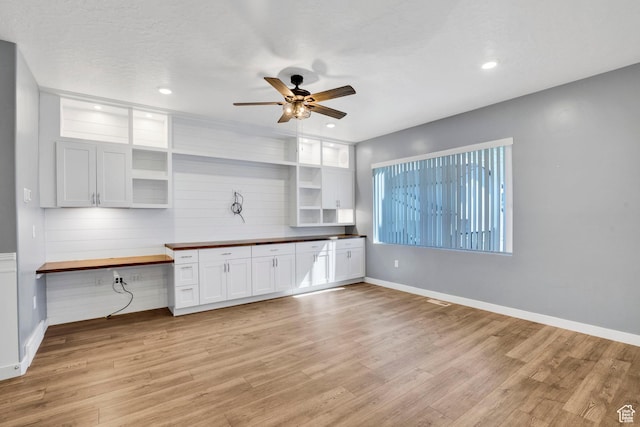 900 E Mecham Ave, Layton, UT 84040 - kitchen with white cabinets, light wood finished floors, ceiling fan, butcher block counters, and open shelves