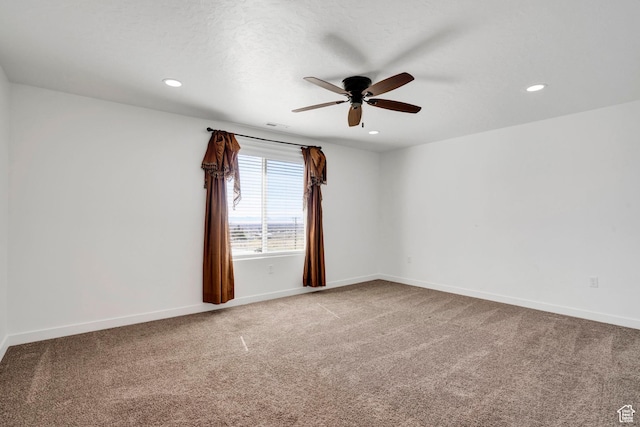 900 E Mecham Ave, Layton, UT 84040 - spare room featuring light carpet, baseboards, recessed lighting, and a ceiling fan