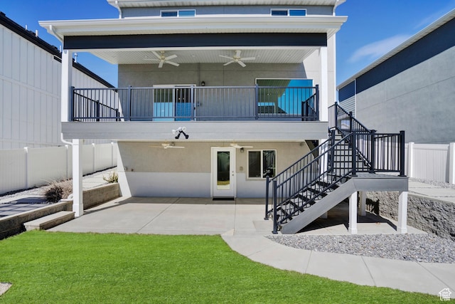 900 E Mecham Ave, Layton, UT 84040 - rear view of house with fence, stairway, a ceiling fan, a yard, and a patio area