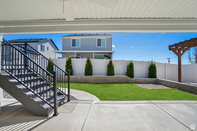 900 E Mecham Ave, Layton, UT 84040 - view of patio / terrace featuring a fenced backyard and stairs