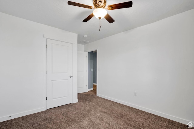 900 E Mecham Ave, Layton, UT 84040 - unfurnished bedroom with carpet flooring, a ceiling fan, and baseboards