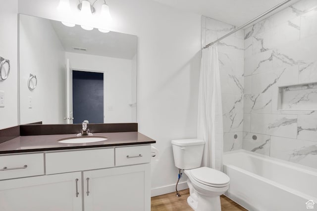 900 E Mecham Ave, Layton, UT 84040 - full bathroom featuring vanity, shower / bathtub combination with curtain, toilet, visible vents, and wood finished floors