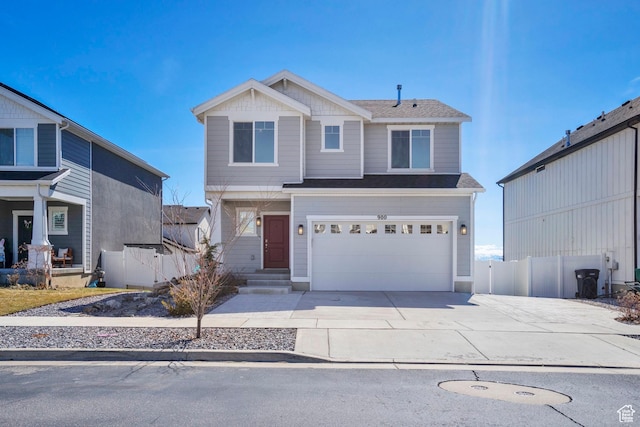 900 E Mecham Ave, Layton, UT 84040 - view of front of home featuring driveway, a garage, fence, and a shingled roof