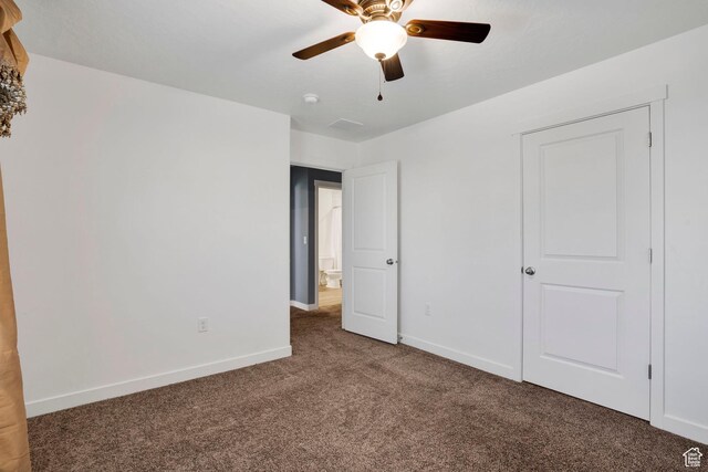 900 E Mecham Ave, Layton, UT 84040 - unfurnished bedroom with baseboards, ceiling fan, and carpet