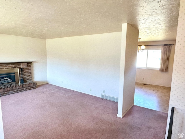 2662 W Toni Lee St, West Jordan, UT 84088 - unfurnished living room featuring a fireplace, carpet flooring, a textured ceiling, and visible vents