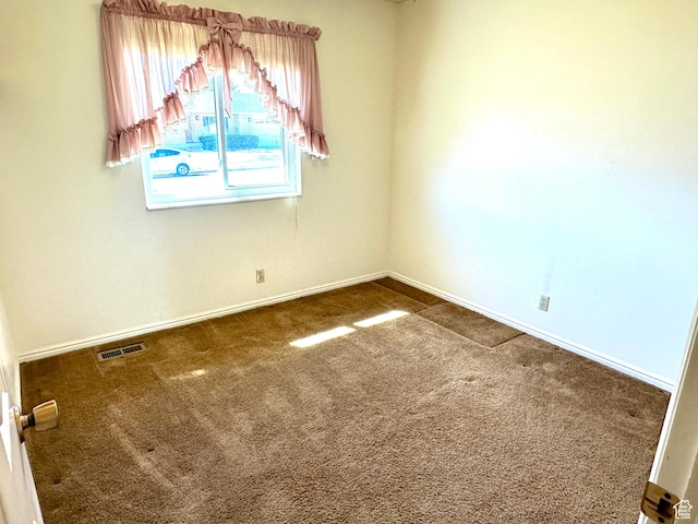 2662 W Toni Lee St, West Jordan, UT 84088 - unfurnished room featuring baseboards, visible vents, and carpet floors