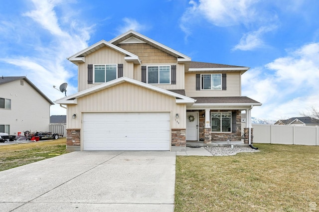 craftsman inspired home featuring a front yard, stone siding, concrete driveway, fence, and a porch