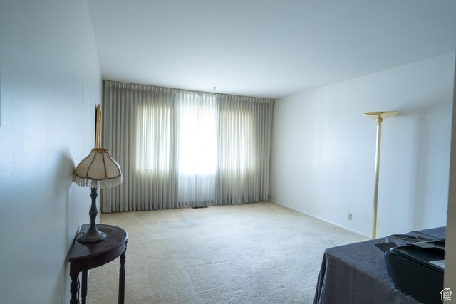 4971 S Beaver Brook Ln E Unit 40, Murray, UT 84117 - living area with carpet flooring