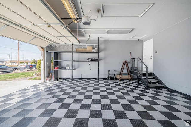 garage featuring a garage door opener