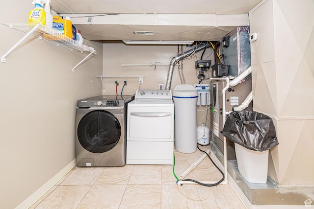 laundry area featuring washing machine and dryer
