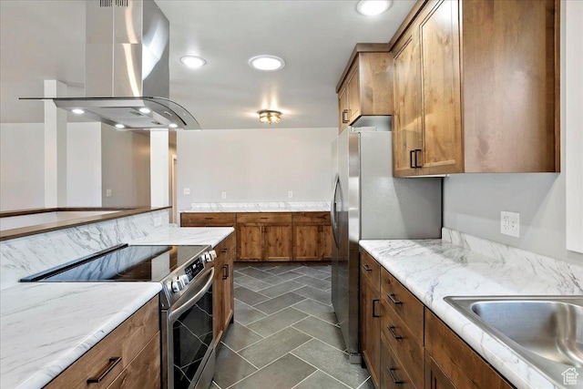 kitchen featuring a sink, brown cabinetry, island exhaust hood, stainless steel electric stove, and recessed lighting