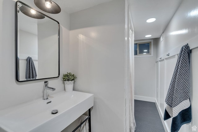 1311 E 29th St S, Ogden, UT 84403 - full bathroom with baseboards, recessed lighting, and a sink