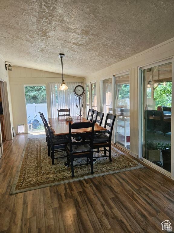 223 N 2520 W, Provo, UT 84601 - dining space with a textured ceiling, wood finished floors, and vaulted ceiling