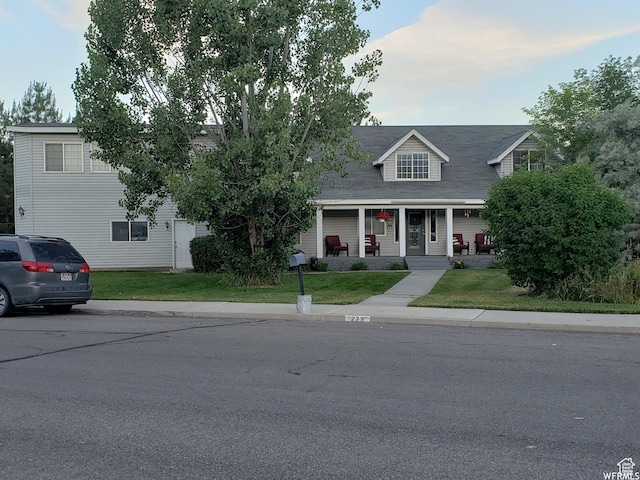 223 N 2520 W, Provo, UT 84601 - view of front of property with a front lawn and covered porch