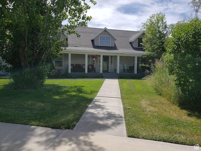223 N 2520 W, Provo, UT 84601 - cape cod house featuring a porch and a front lawn
