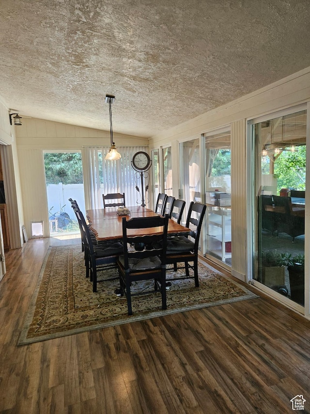 223 N 2520 W, Provo, UT 84601 - dining space featuring a healthy amount of sunlight, vaulted ceiling, wood finished floors, and a textured ceiling