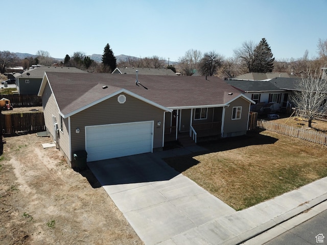 1451 W 925 S, Vernal, UT 84078 - ranch-style house featuring a front yard, driveway, a garage, and fence
