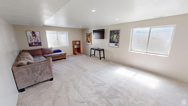 1451 W 925 S, Vernal, UT 84078 - living room featuring light carpet, visible vents, recessed lighting, and a textured ceiling