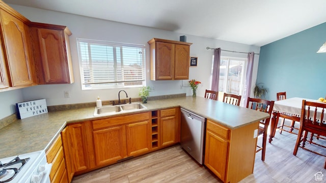 1451 W 925 S, Vernal, UT 84078 - kitchen with a kitchen bar, gas range gas stove, stainless steel dishwasher, a sink, and a peninsula