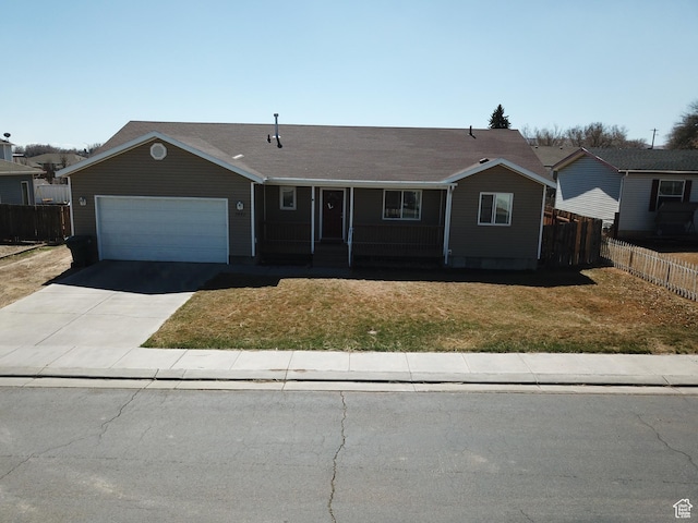 1451 W 925 S, Vernal, UT 84078 - ranch-style house with a garage, fence, a front lawn, and concrete driveway