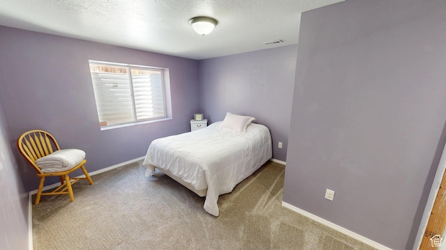 1451 W 925 S, Vernal, UT 84078 - bedroom featuring carpet flooring, a textured ceiling, baseboards, and visible vents