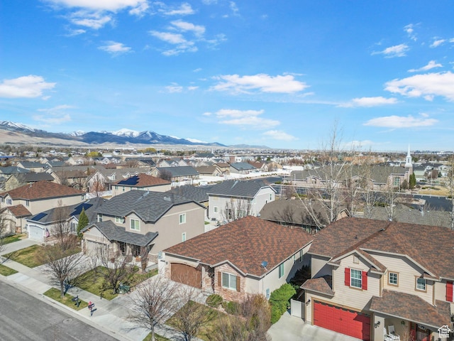 aerial view with a mountain view and a residential view