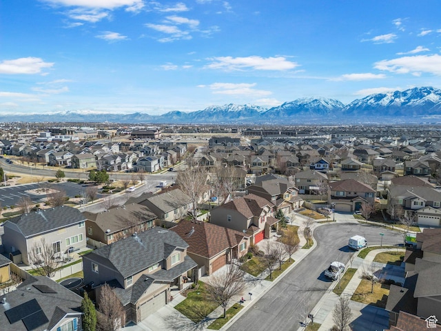 birds eye view of property featuring a residential view and a mountain view