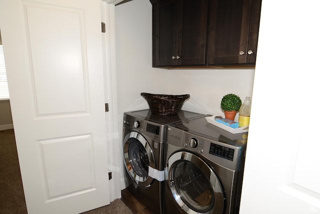 laundry room with cabinet space and washing machine and dryer