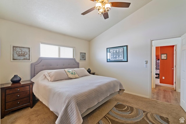 1519 N 2340 W, Clinton, UT 84015 - bedroom with light colored carpet, vaulted ceiling, baseboards, and a ceiling fan