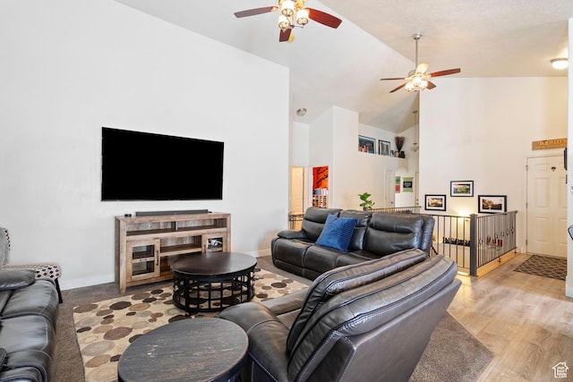 1519 N 2340 W, Clinton, UT 84015 - living area with baseboards, high vaulted ceiling, light wood-style flooring, and a ceiling fan