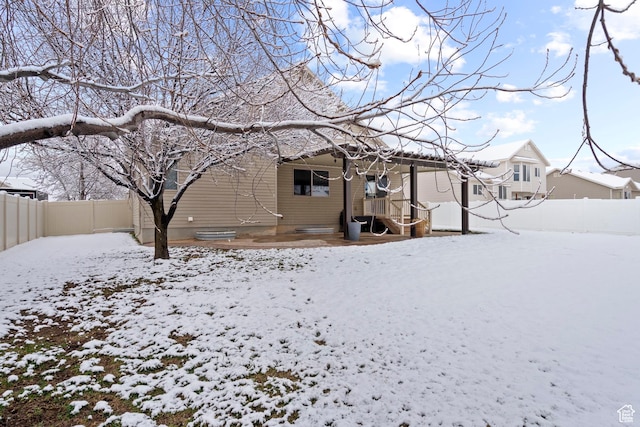 1519 N 2340 W, Clinton, UT 84015 - snow covered rear of property featuring fence