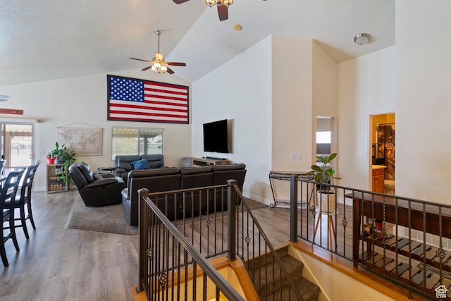 1519 N 2340 W, Clinton, UT 84015 - living room featuring high vaulted ceiling, wood finished floors, and a ceiling fan
