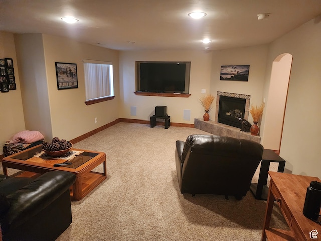 4263 W 11475 S, South Jordan, UT 84095 - carpeted living room with arched walkways, a fireplace with raised hearth, and baseboards