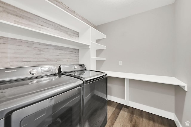 2466 W 3375 S, West Haven, UT 84401 - clothes washing area featuring dark wood-style floors, washing machine and clothes dryer, laundry area, and baseboards