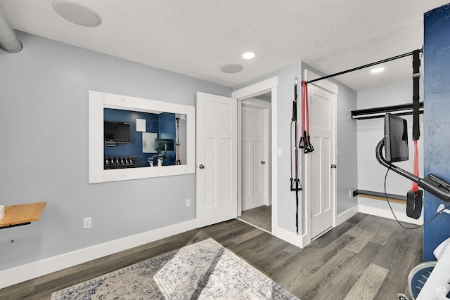 2466 W 3375 S, West Haven, UT 84401 - exercise room with baseboards, a textured ceiling, wood finished floors, and recessed lighting