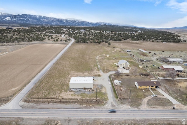 aerial view featuring a mountain view and a rural view