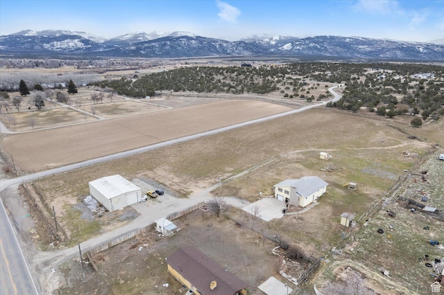 bird's eye view featuring a mountain view and a rural view