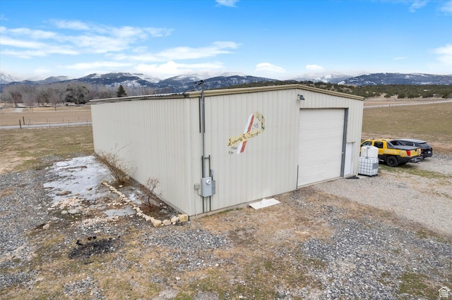 view of outdoor structure with an outbuilding and a mountain view